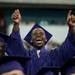 A graduate cheers as a fellow classmate receives a diploma  during Pioneer's 2013 graduation ceremony, Thursday June 6. Courtney Sacco I AnnArbor.com
